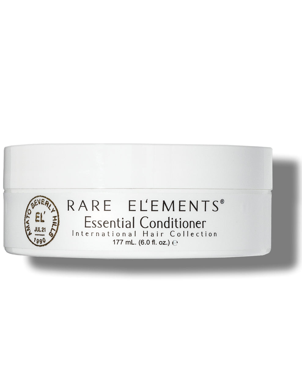 A white jar of Rare Elements Essential Conditioner Daily Masque on a white background.