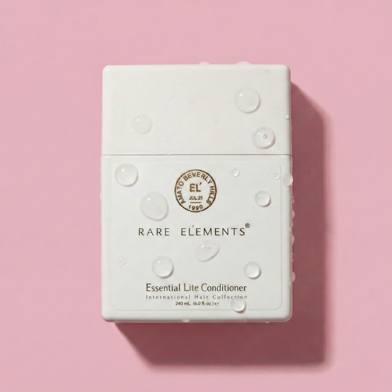 Free People, Rare Elements Essential Lite Conditioner bottle with packaging on a white background 